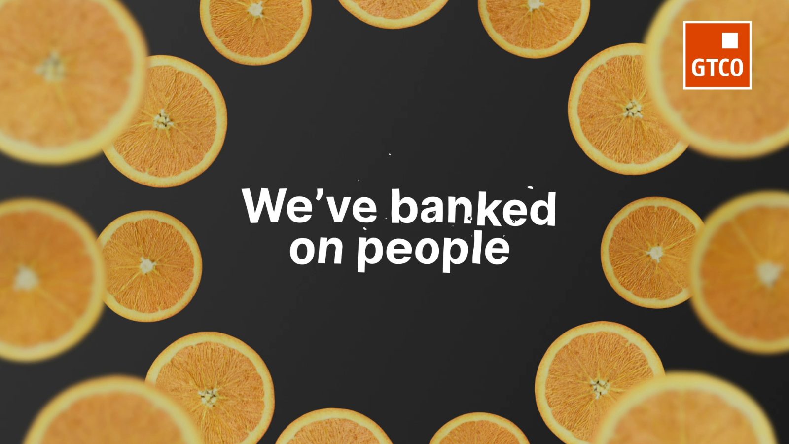 Lyric frame reading we've banked on people, ringed by orange slices